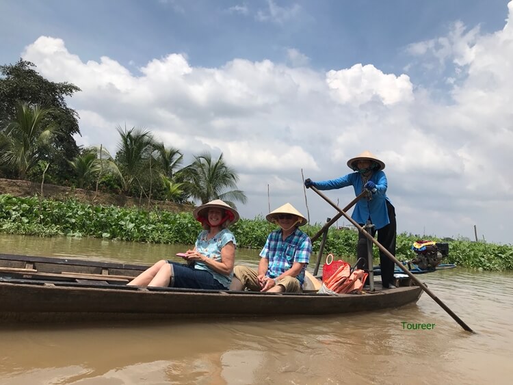 Take a boat to visit Mekong Delta
